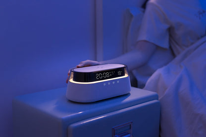 UK Technology Glass Top Clock Radio Speaker in a dark bedroom setting