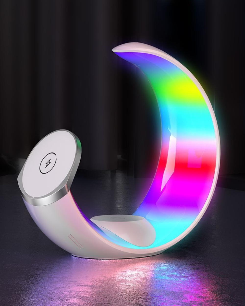 the moon lamp in rainbow mode lighting up a bedroom
